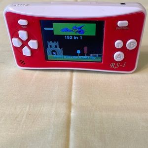 RS-1. Handheld game.  Retro portable. Works great.